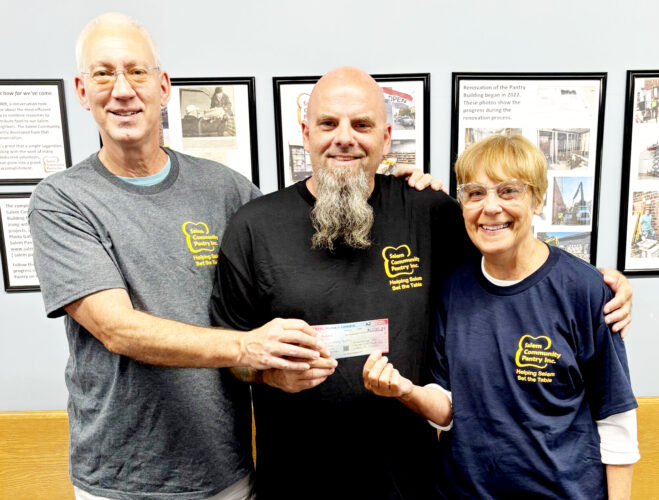 Salem pantry receives donation from Salem Car Cruise